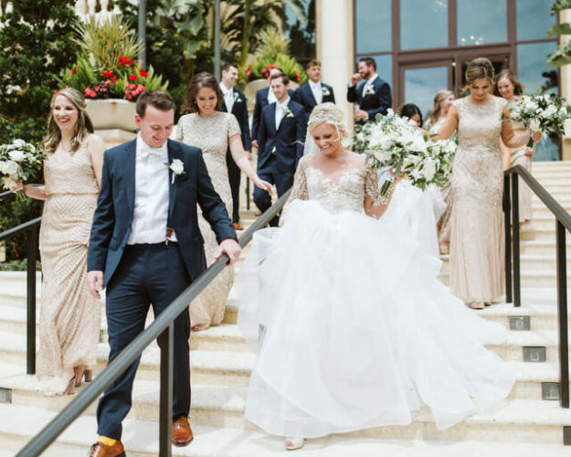 lindsey-and-kyle-four-seasons-disney-chalk-shop-recessional-1