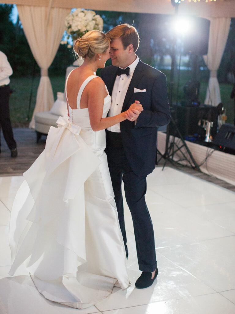 bride and groom dancing